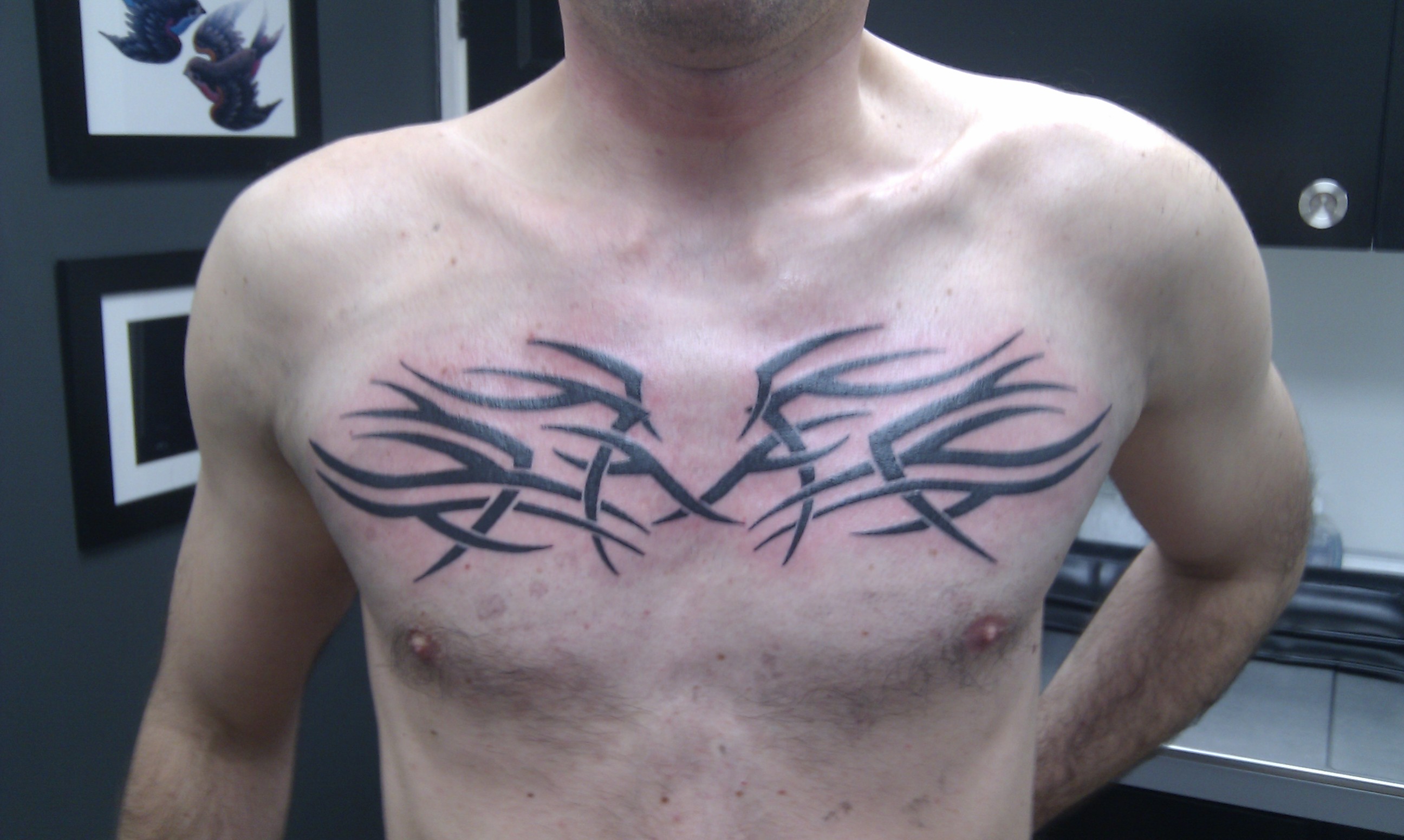 Tribal chest tattoo designs